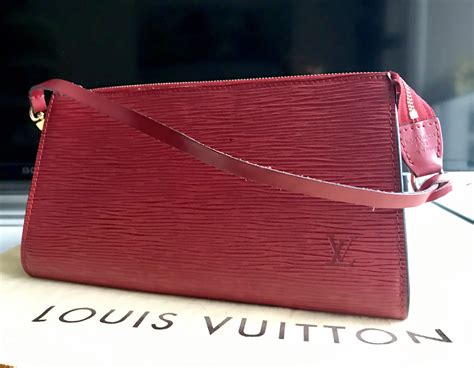 louis vuitton epi leather pochette price|louis vuitton epi leather clutch.